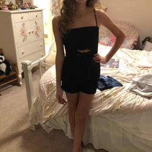 Junior Girls black slim romper with cutout. So cute on! Size Small.